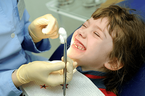 happy child receiving dental examination