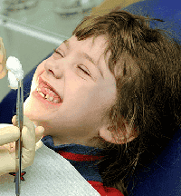 happy child receiving dental examination